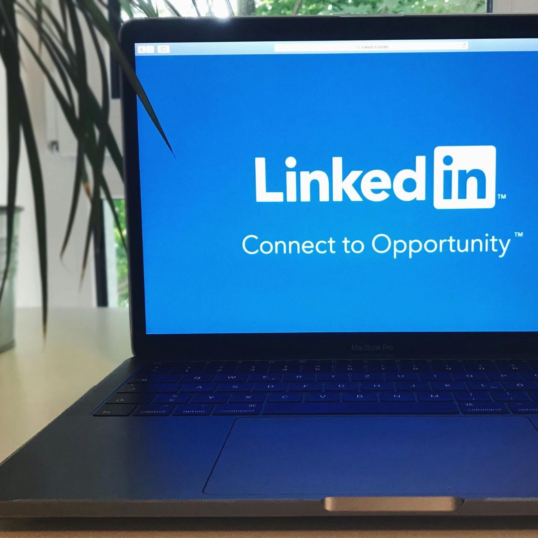 LinkedIn for mortgage brokers displayed on laptop screen showing platform interface